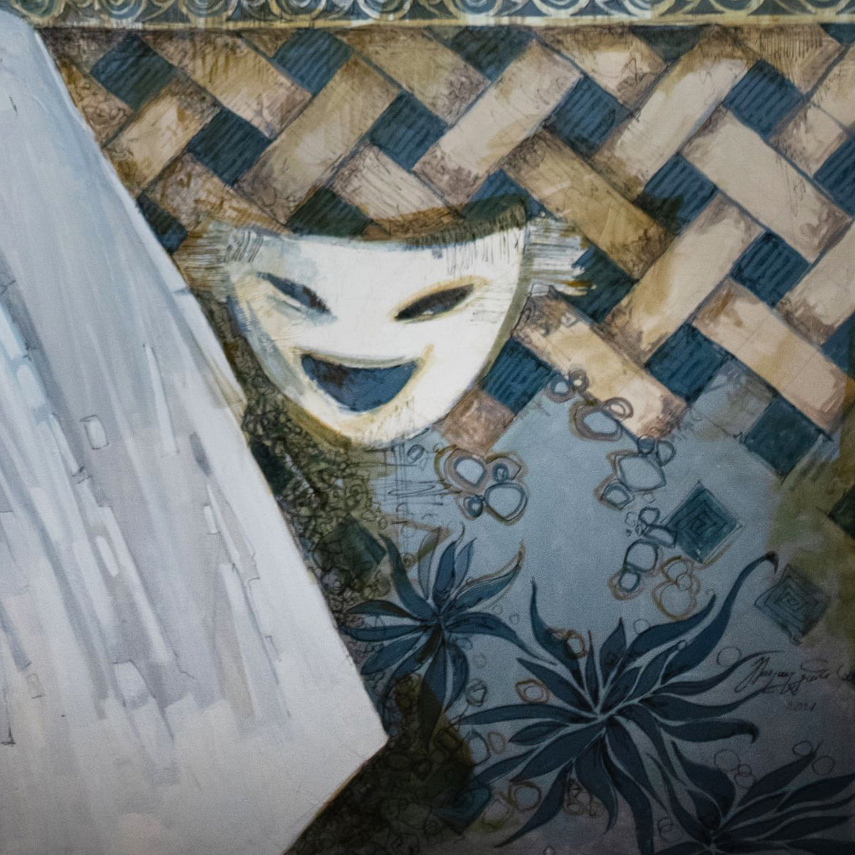 Decorative wall art with a mask and geometric patterns