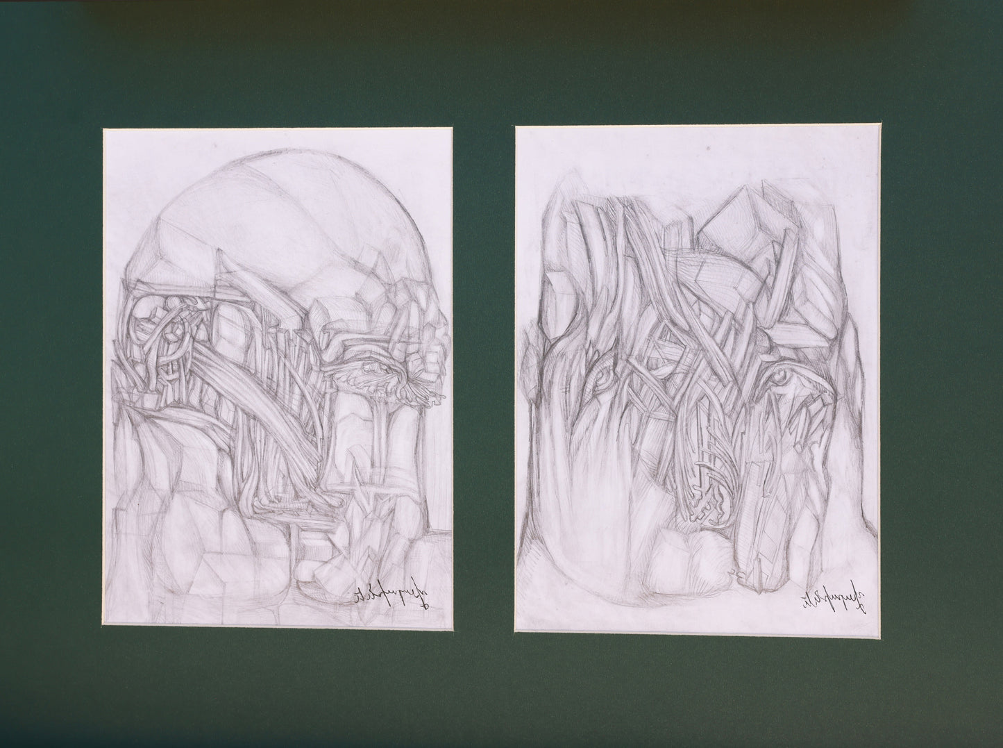 Two pencil sketches on white paper against a dark green background